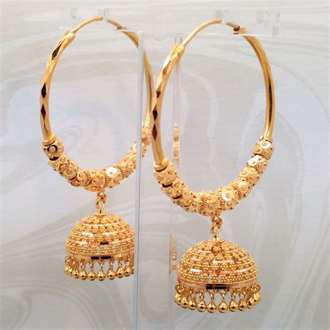 designer gold hoop earrings.